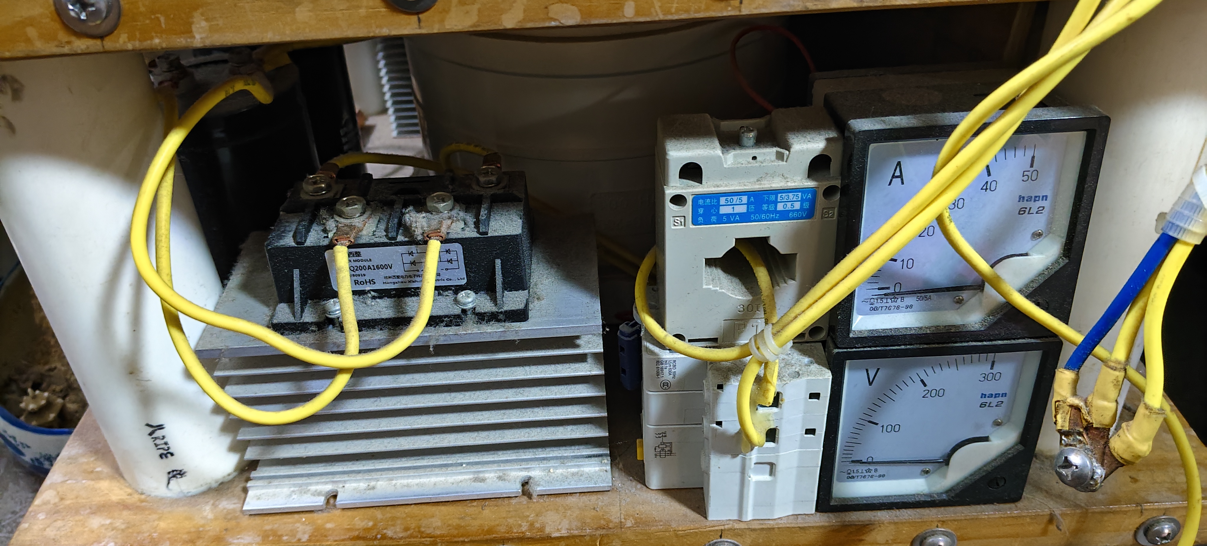Heavy power stage with IGBT module, heatsink, breaker, and analog meters