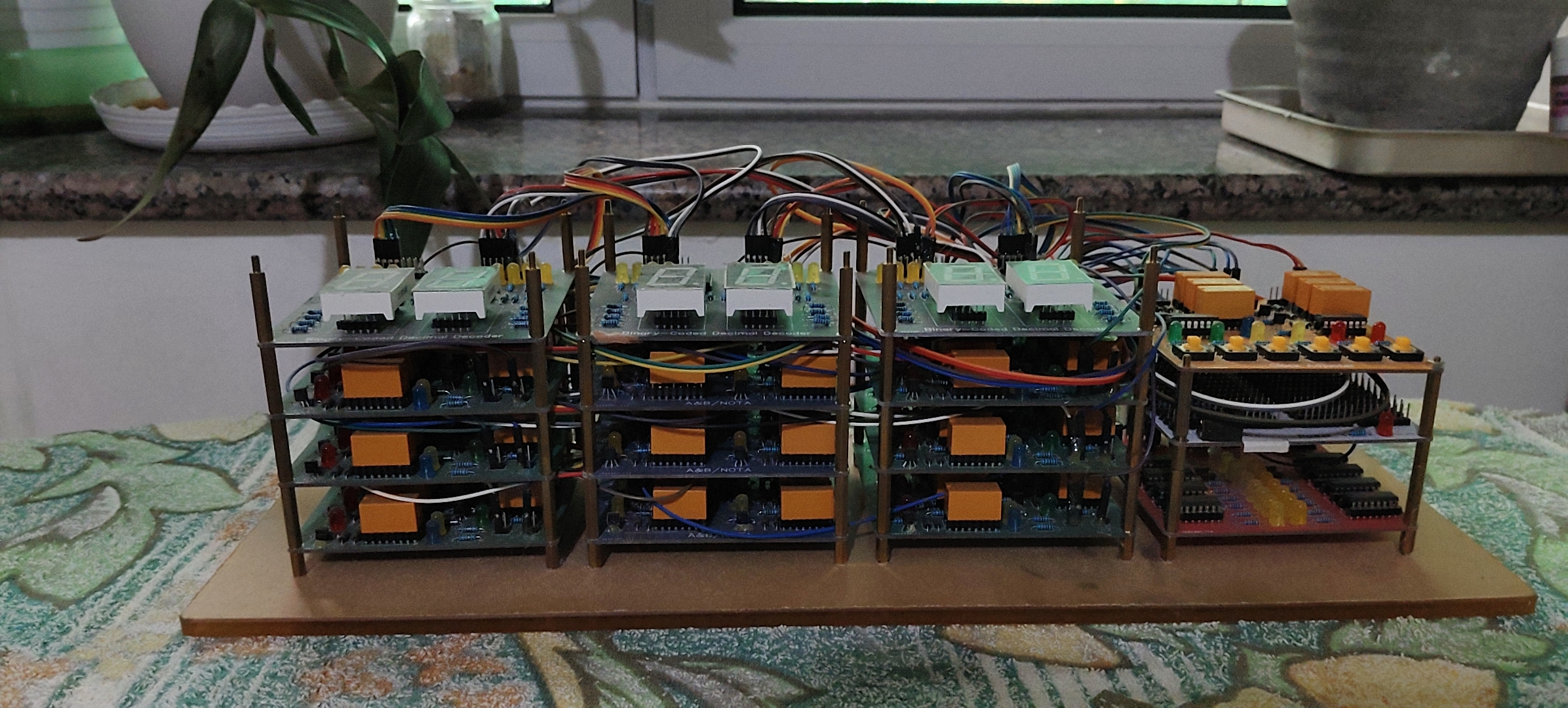 Stacked relay clock assembly side view